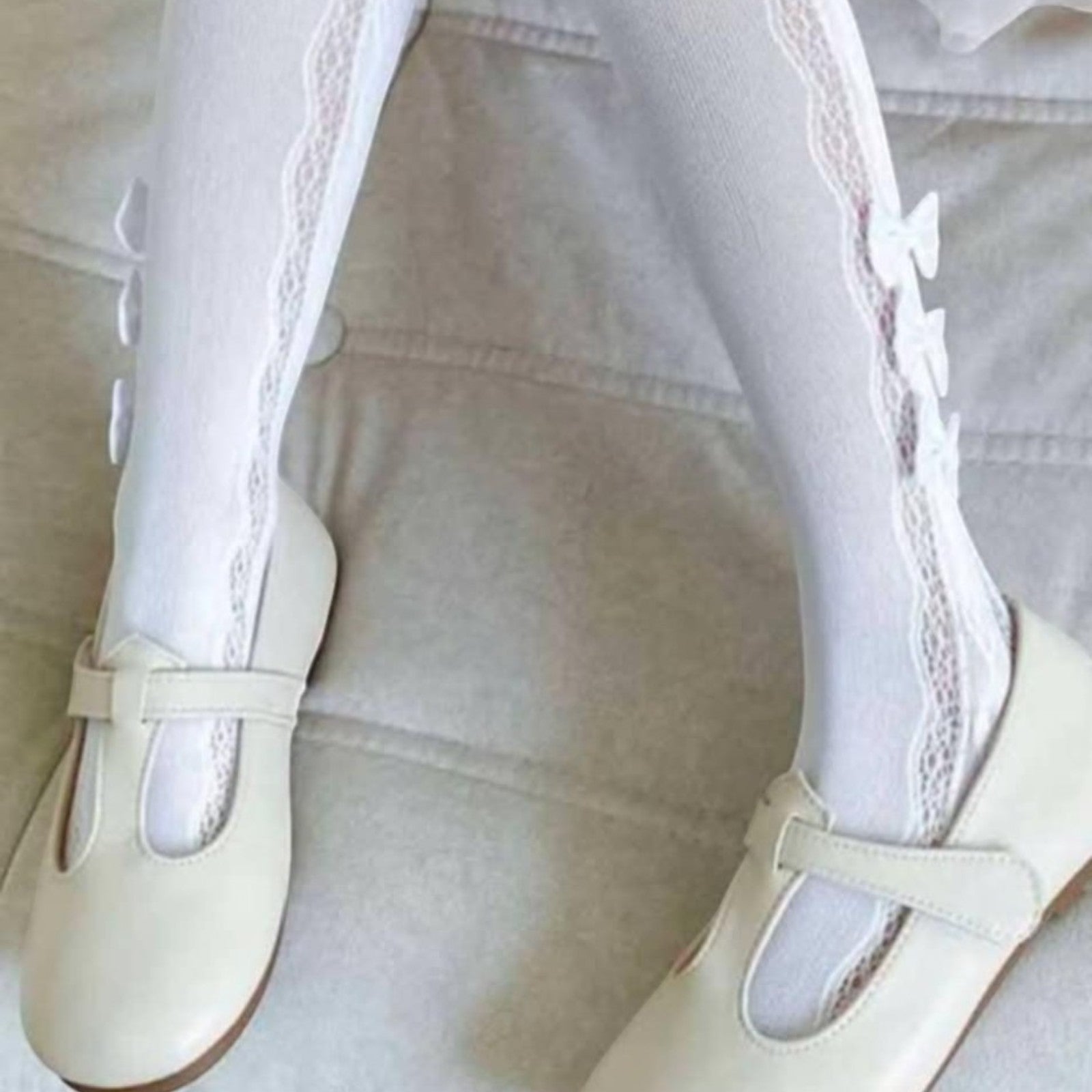 Openwork tights with a bow for girls white Kidodido K2316-1-15425